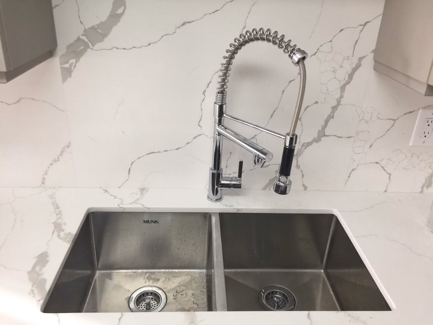 Pro coil-spring kitchen faucet, side angle